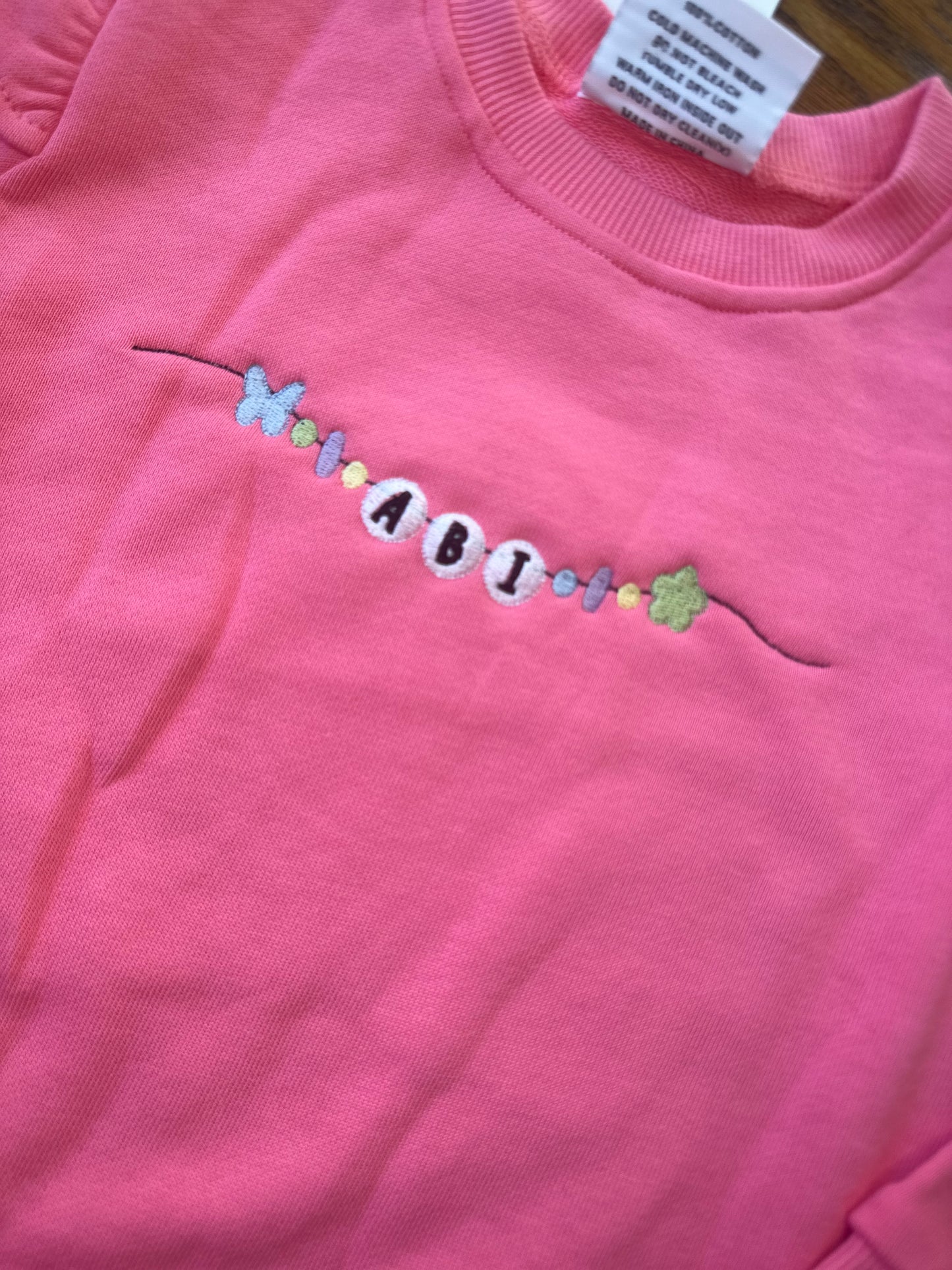 Friendship bracelet sweatshirt