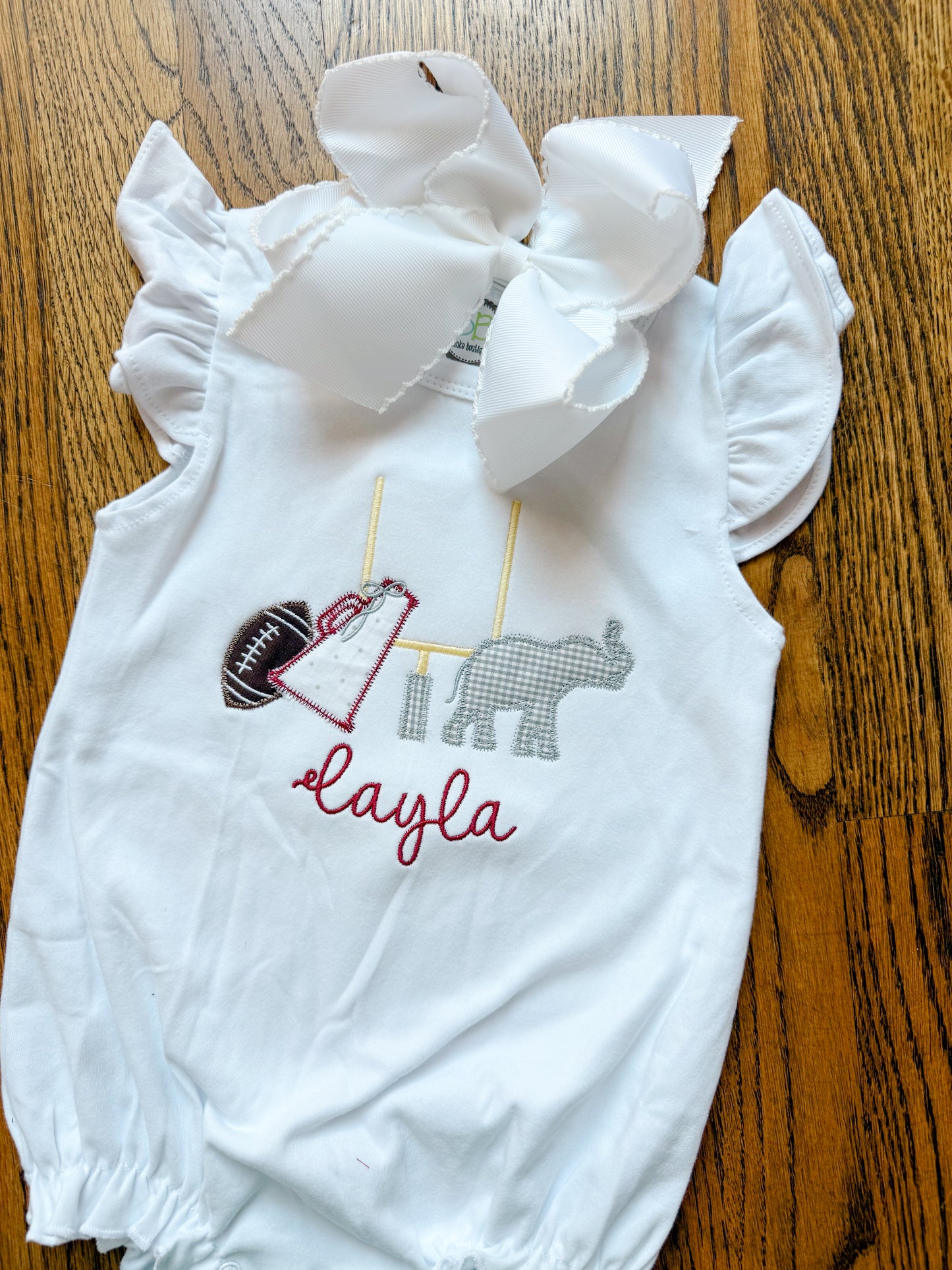 Elephant football w/ bow applique