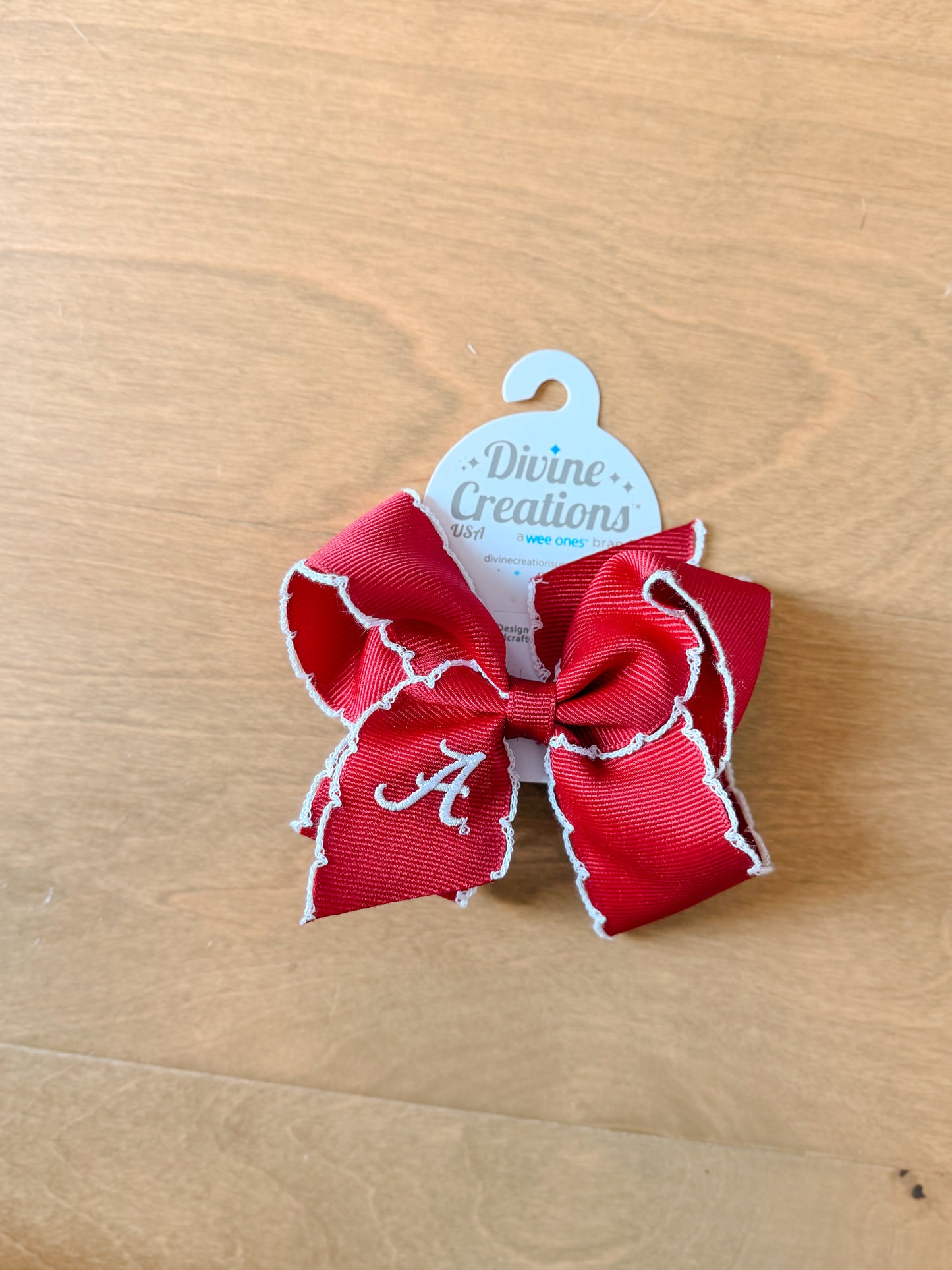 Alabama medium embroidered moonstitch bow