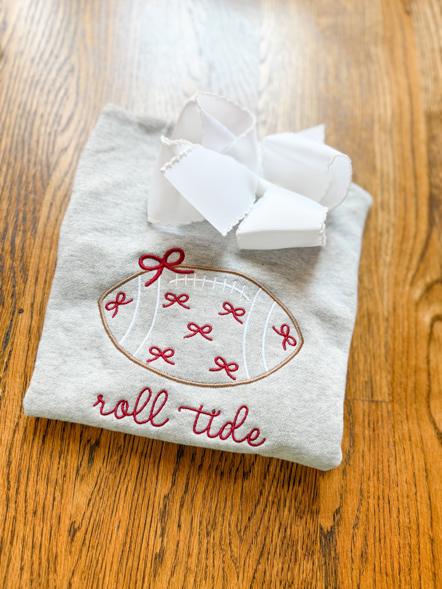 Football outline w/ bows sweatshirt